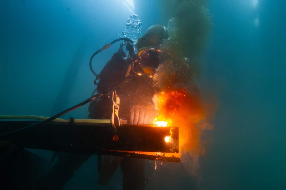 A commercial diver welding underwater.