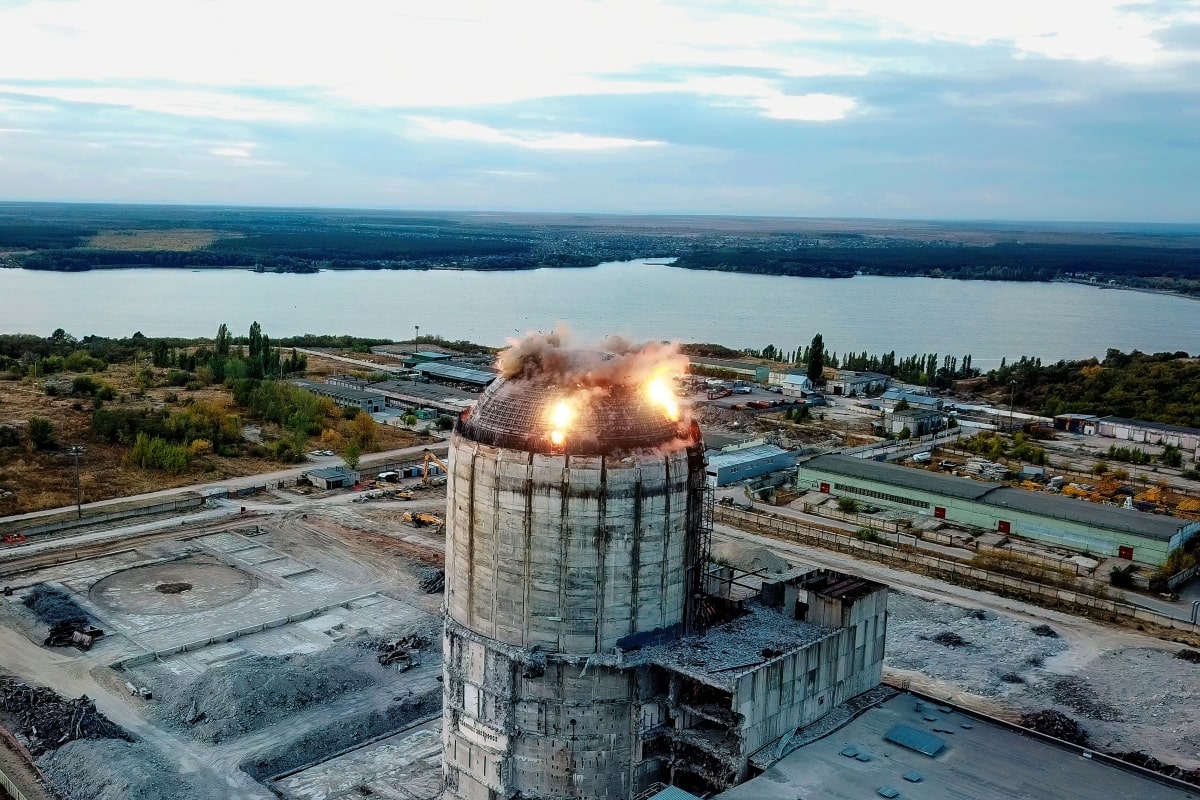 Image depicts using explosives for demolition or construction.