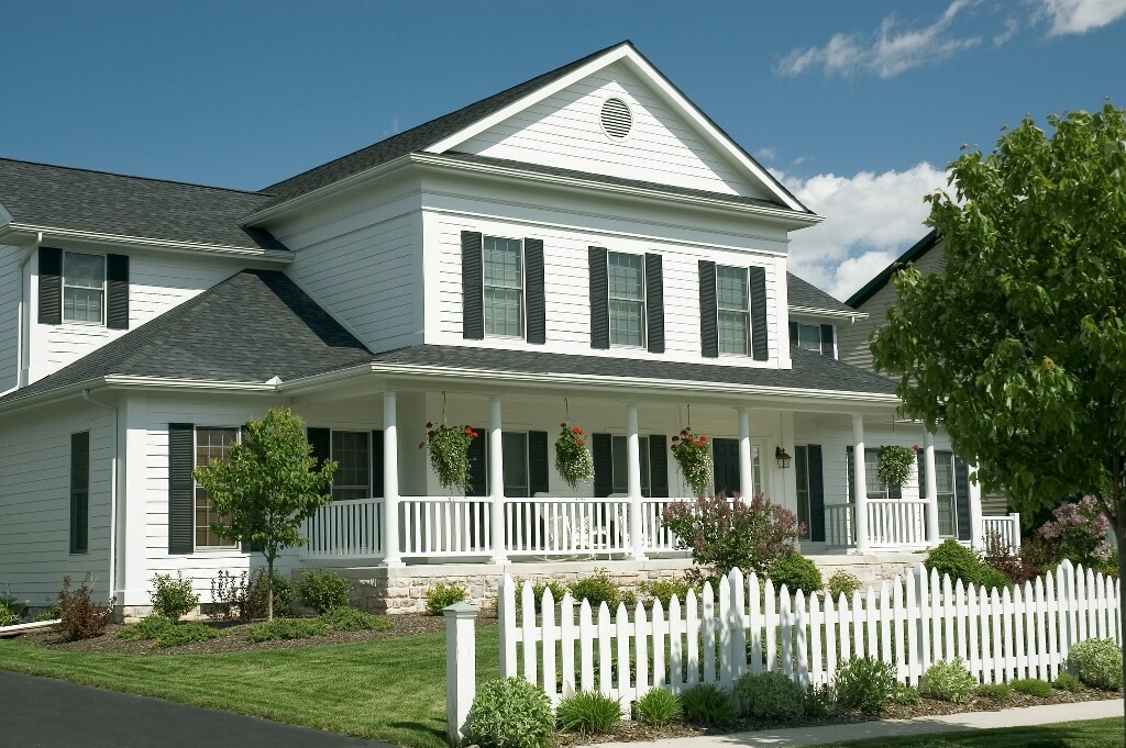 Charming-looking house with white picket fencing